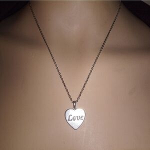 Long chain with a Sterling jwbr heart charm